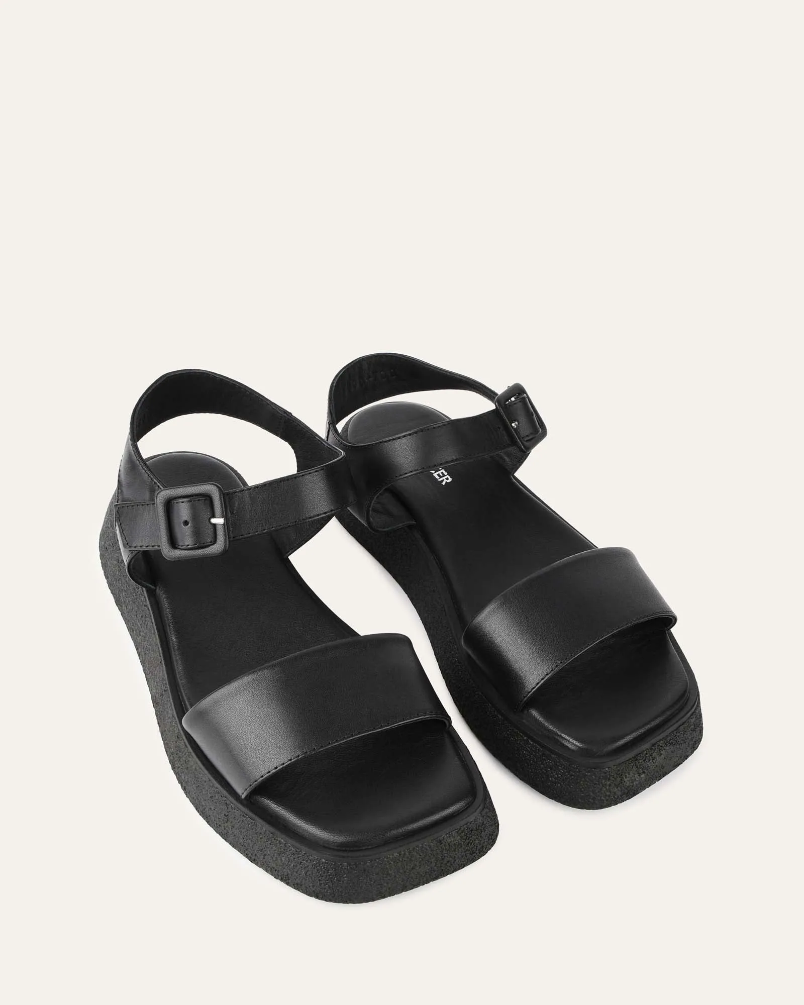 SANDALES PLATES ZURI EN CUIR NOIR